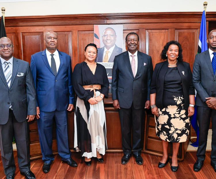 Prime Cabinet Secretary Musalia Mudavadi (third from right) with APRM CEO Amb. Marie-Antoinette Rose Quatre (third from left) during a courtesy call in Nairobi. Photo courtesy.