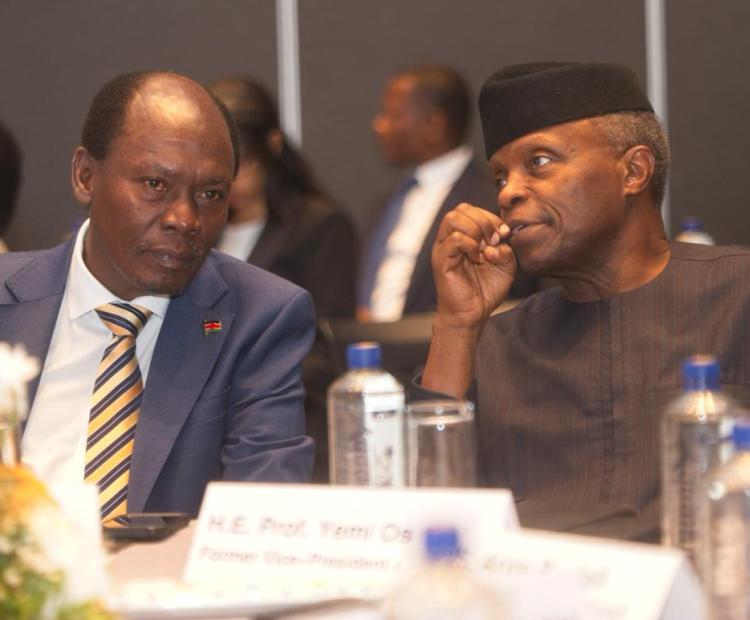 The Cabinet Secretary, Ministry of Information, Communications and the Digital Economy, William Kabogo Gitau, having tête-à-tête with the Former Vice-President of Nigeria, Prof. Yemi Osinbajo during the Public-private dialogue on mobilising the private sector for sustainable trade and investment in the agrifood sector in Africa, held in Nairobi. PHOTO: ALFRED MWANIKI