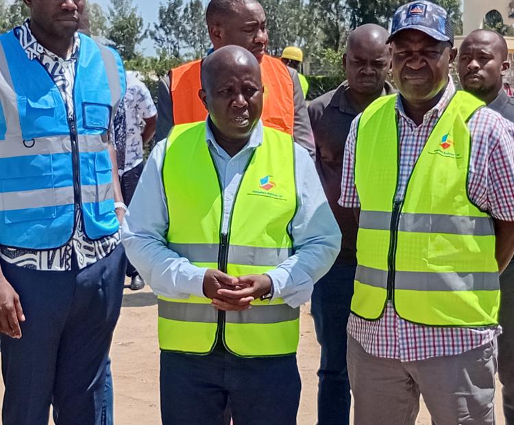 ICT Principal Secretary Eng. John Tanui (centre) during inspection of ongoing construction of digital hubs in Bondo and Rarieda Sub-Counties. He was accompanied by Health PS Dr Ouma Oluga (Left) and Kisumu Deputy Governor Mathews Owili(right).