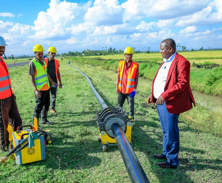 County Executive Committee (CEC) Member for Environment, Energy, Climate Change, Natural Resources, Water and Irrigation, James Mutugi, inspecting the ongoing project.