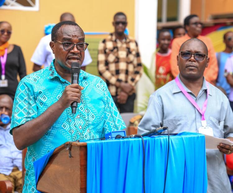 Education Cabinet Secretary, Julius Migos Ogamba speaking during the commissioning of a new Sh150-million five-storey academic block at the Kenya Coast National Polytechnic in Mombasa. Looking on is the institution’s Principal Andama Geoffrey Nyamweya (right). PHOTO: SITATI REAGAN
